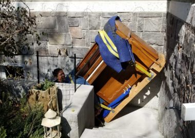 small -135640 Upright piano on skid board piano move from basement in sandy utah