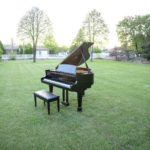 Small -small -7082-2 rental piano in grass in riverton utah